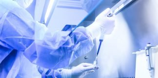 The Dual Nature of Polyamines: Study Shows How Anti-Aging Molecules Can Also Fuel Cancer Growth Scientist in biomedical laboratory. Photo courtesy: © 2019 – 2020 Fotolia/Adobe Used with permission.