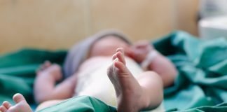 Johns Hopkins Study Links Blood Transfusions with Dangerous Digestive Disease in Preemies A close up of a newborn baby's foot in the neonatal unit in hospital